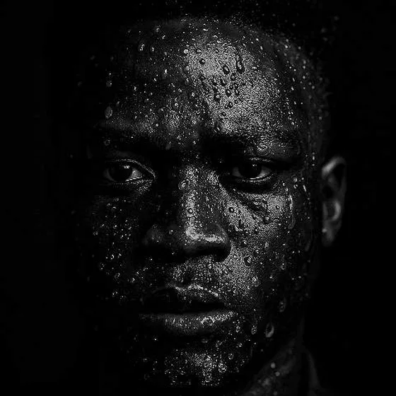 Black-and-white portrait of Eze Prince Junior Onyemauchechukwu